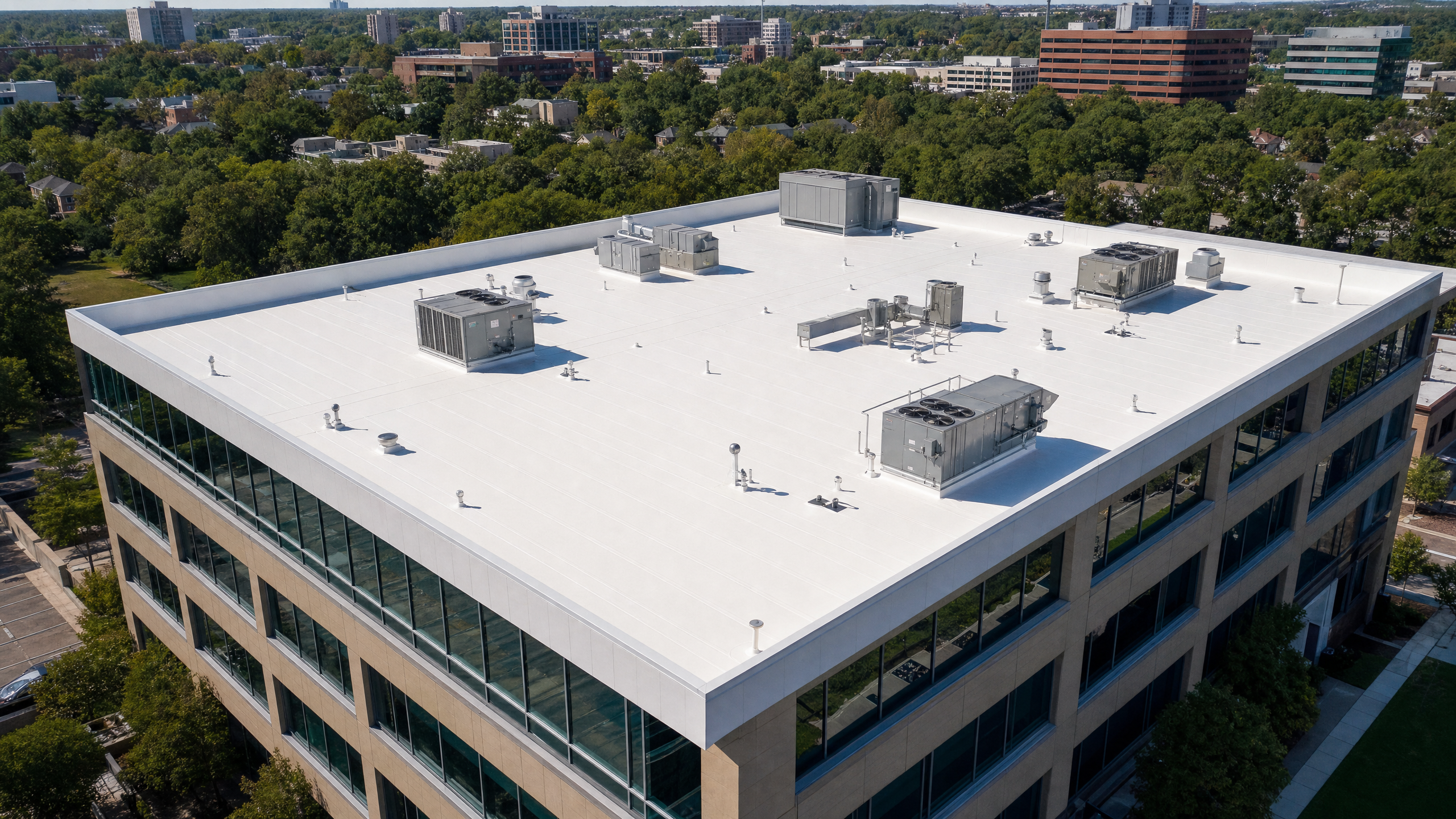 Aerial view of a white commercial roof system